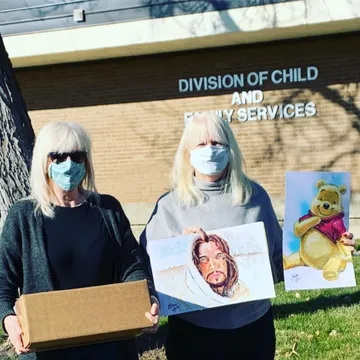 A Change 4 Love painting delivered to a child