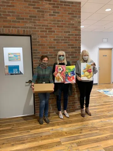 A Change 4 Love painting delivered to a child