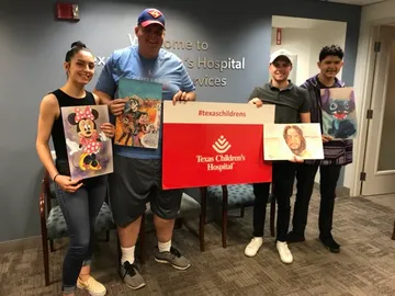 A Change 4 Love painting delivered to a child