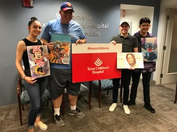 A Change 4 Love painting delivered to a child