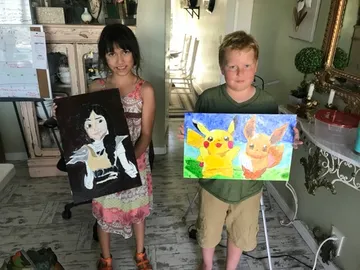A Change 4 Love painting delivered to a child
