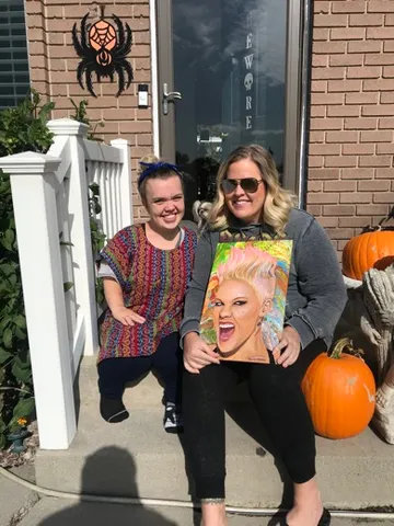 A Change 4 Love painting delivered to a child