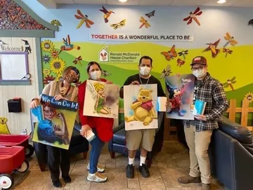 A Change 4 Love painting delivered to a child
