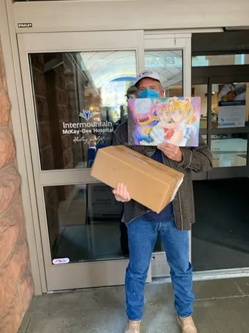 A Change 4 Love painting delivered to a child