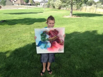 A Change 4 Love painting delivered to a child