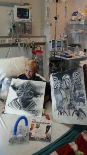 A Change 4 Love painting delivered to a child
