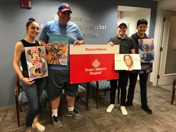 A Change 4 Love painting delivered to a child