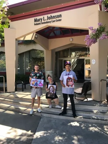 A Change 4 Love painting delivered to a child