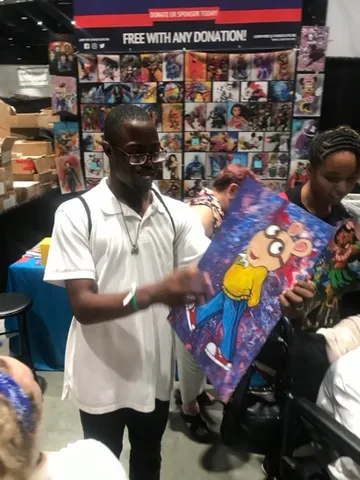 A Change 4 Love painting delivered to a child