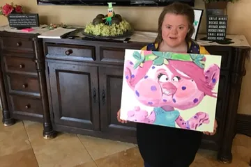 A Change 4 Love painting delivered to a child
