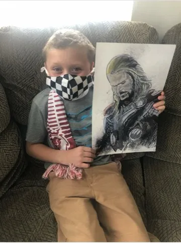 A Change 4 Love painting delivered to a child